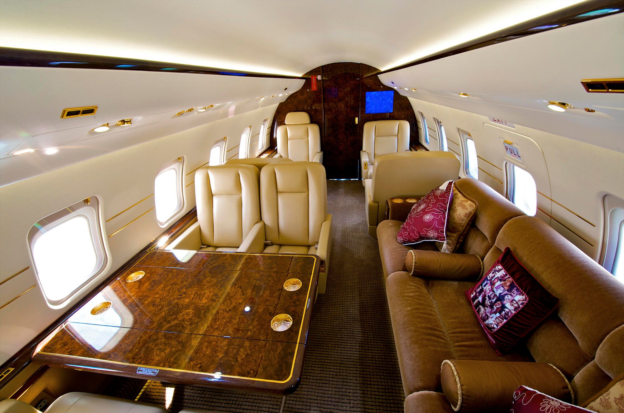 Executive jet cabin with wide leather seats
